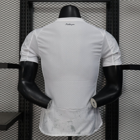 Back of Manchester City 25/26 away jersey with marble pattern and mesh panels