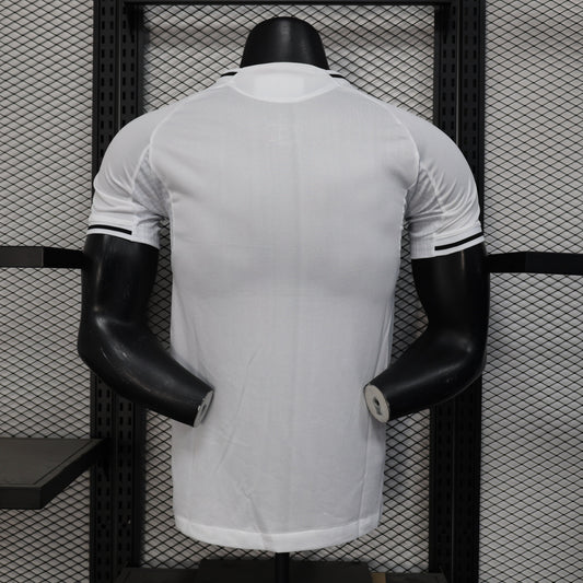 White New Castle 25/26 home player jersey with black trim on mannequin