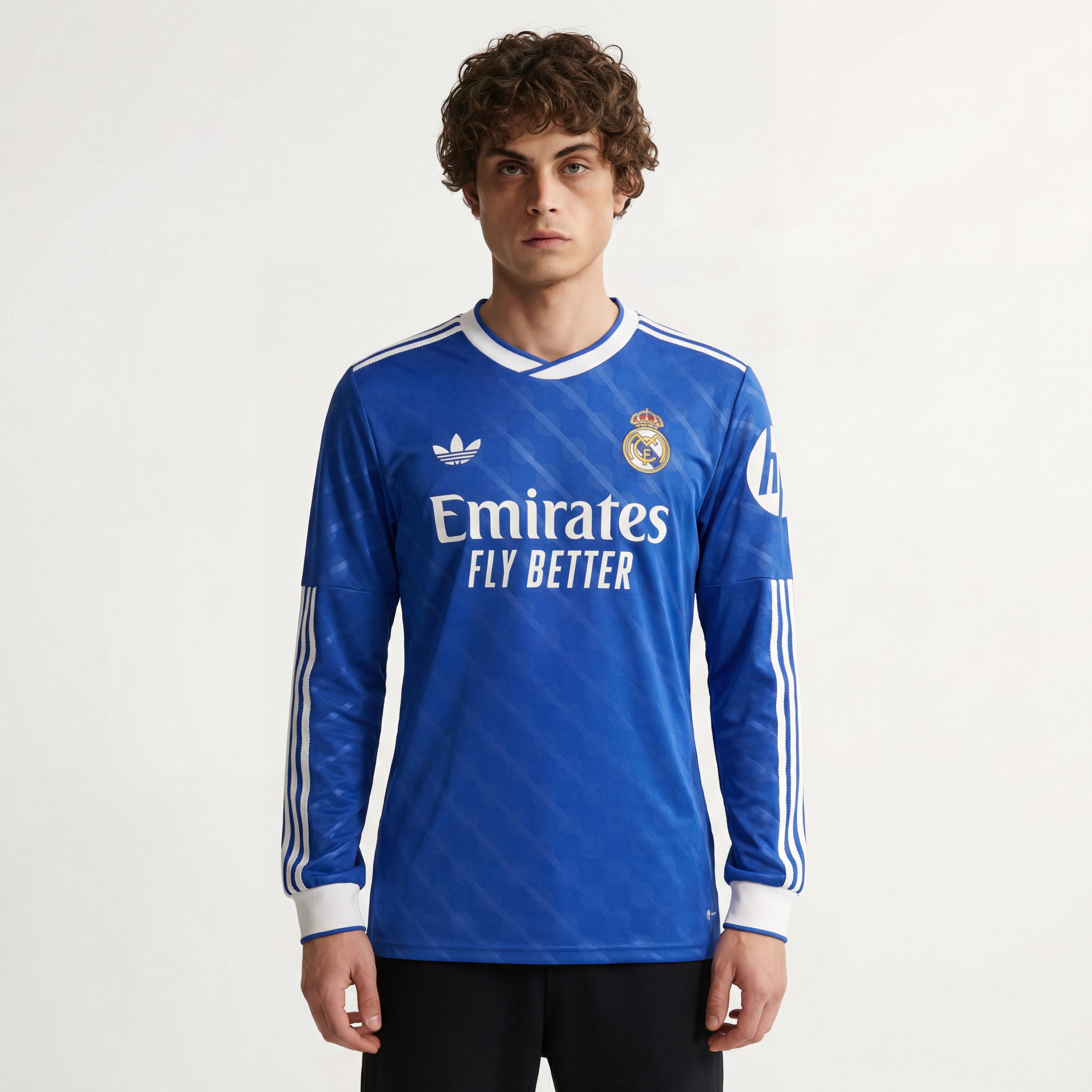 Royal blue Real Madrid 25/26 long sleeve third jersey front view